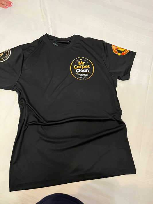 Mr Carpet Clean black performance team top with personalised football club sleeve badge, front view