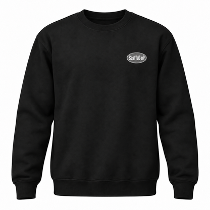ScaffeD-uP black crew-neck sweatshirt mock-up showing the oval logo on the wearer’s left chest.